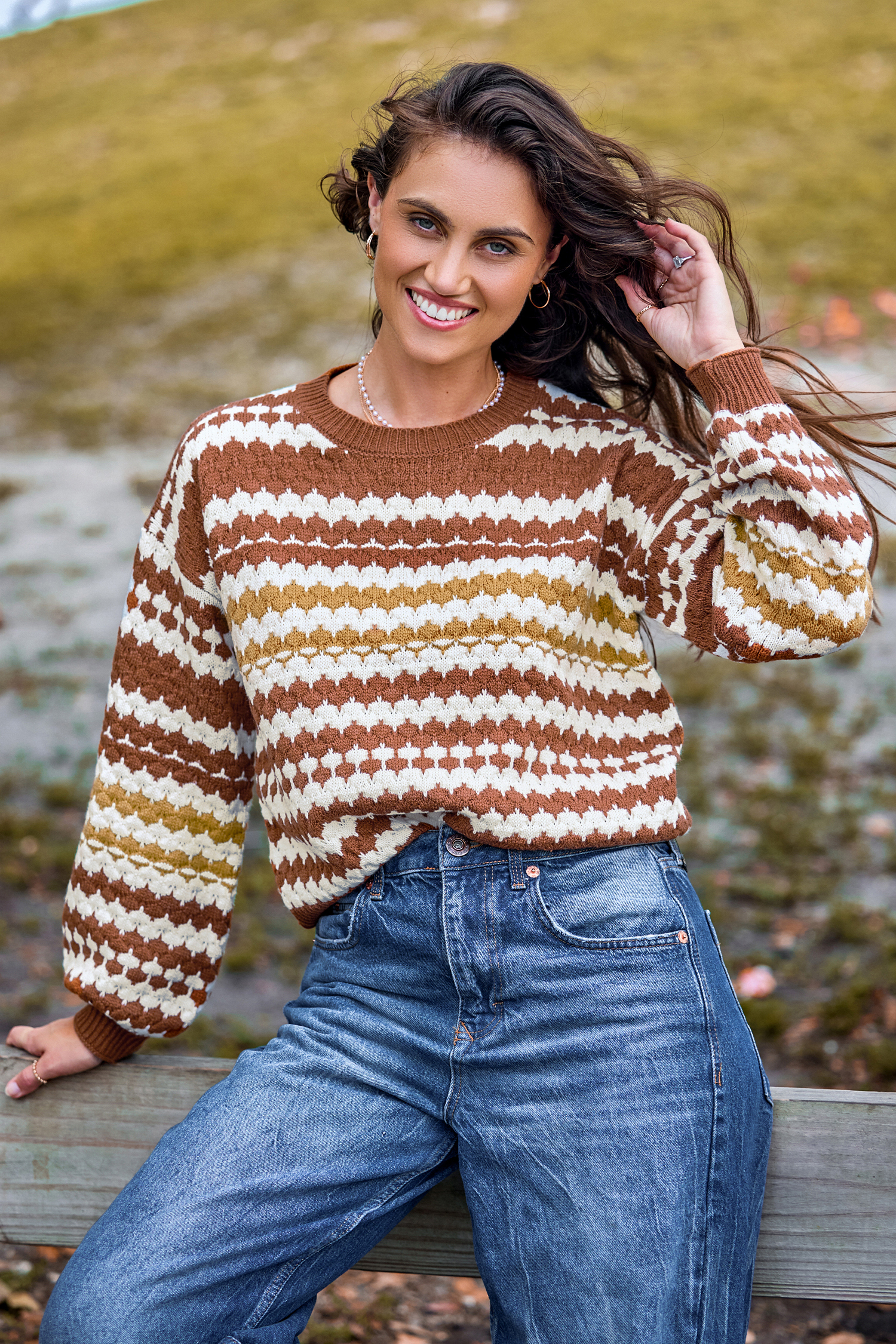 Bild von Orangefarbener unregelmäßig gestreifter Langarmpullover