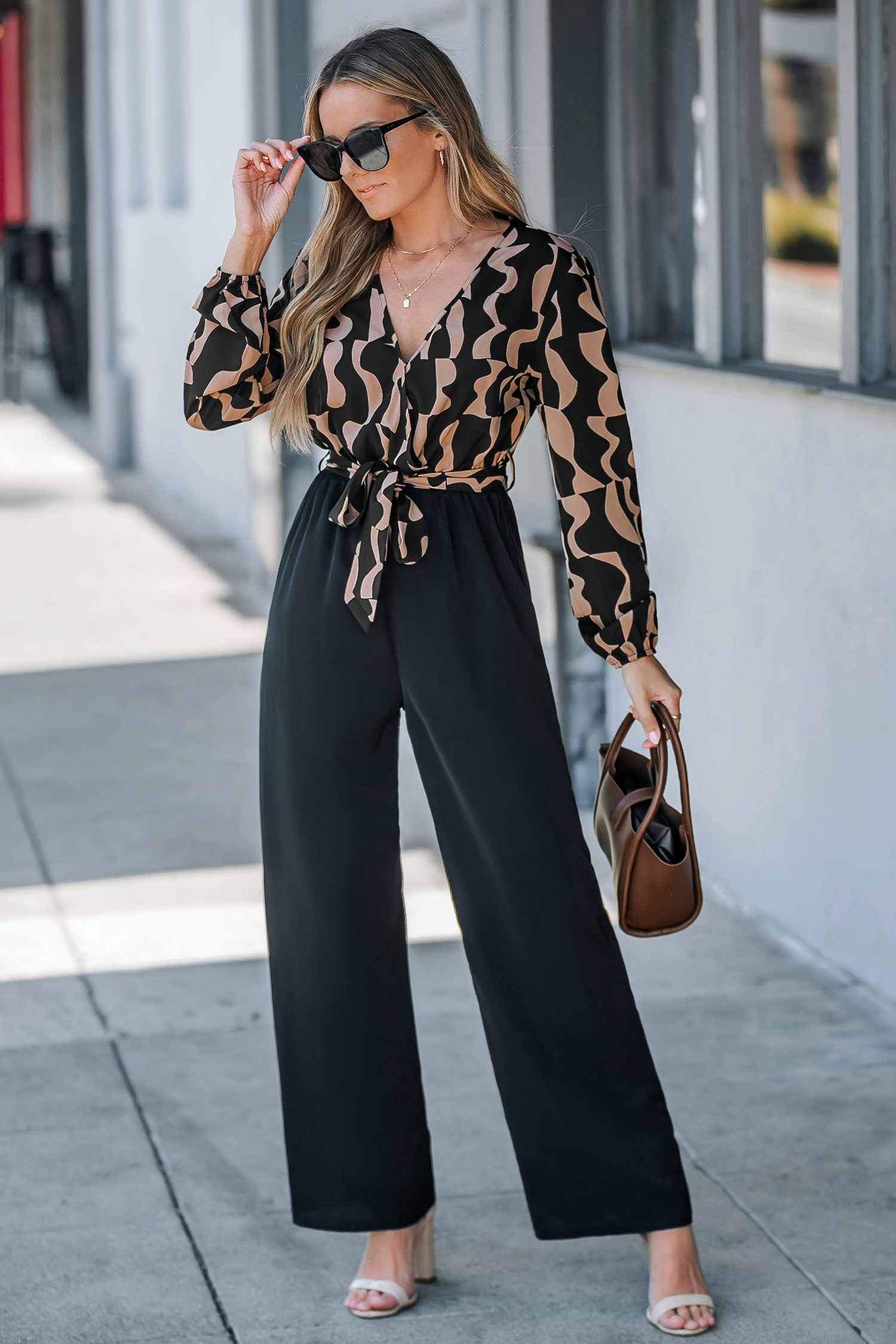 Bild von Geo Langarm-Jumpsuit mit Taillenband