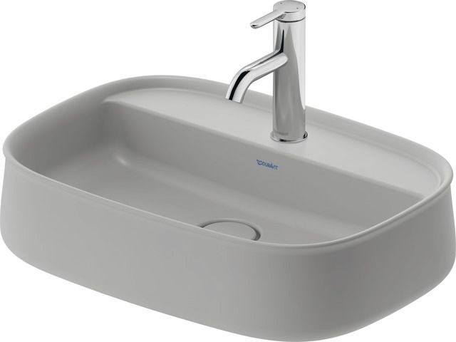 Bild von Duravit Zencha1 BeckenFür 1-Loch-Armaturen geeignet1 WaschplatzFür die Montage mit Möbeln geeignetMit HahnlochbankUnterseite geschliffen, daher für die Montage auf Konsolen oder Waschtischunterschränken mit Konsole geeignetOhne ÜberlaufAufsatz-MontageAufgesetztInnovatives Material DuraCeram®: Ermöglicht filigrane Formen mit extrem dünnen Wandstärken - hygienisch, pflegeleicht und dabei äußerst robust, abrieb- und kratzfestAus hochwertiger, langlebiger Sanitärkeramik: Besonders widerstandsfähiges, kratzresistentes Material mit hohem Härtegrad, reinigungsfreundlicher und hygienischer OberflächeHahnlochbank bietet praktische Ablagefläche z. B. für SeifeMit keramischer Ventilabdeckhaube in Beckenfarbe: Becken und Ventil verschmilzen optisch zu einer perfekten EinheitInklusive nicht verschließbarem Ablaufventil mit keramischer Abdeckung in Beckenfarbe: Becken und Ventil verschmilzen optischen zu einer perfekten EinheitAblaufventil ohne Staufunktion, lässt das Wasser immer ablaufen