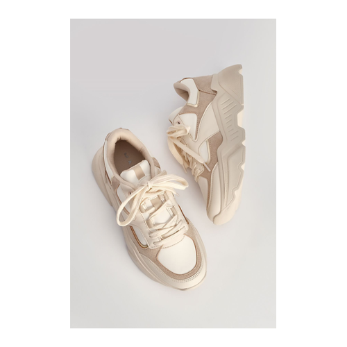 Bild von Marjin Sneaker Beige – Eleganter Begleiter für Damen