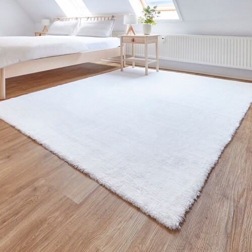 Bild von andiamo Teppich Lambskin - Kunstfell - flauschiger Teppich Schlafzimmer - geeignet als Bettvorleger Schlafzimmer oder als Fellteppich Wohnzimmer - Lammfellimitat pflegeleicht 55 x 110 cm weiß