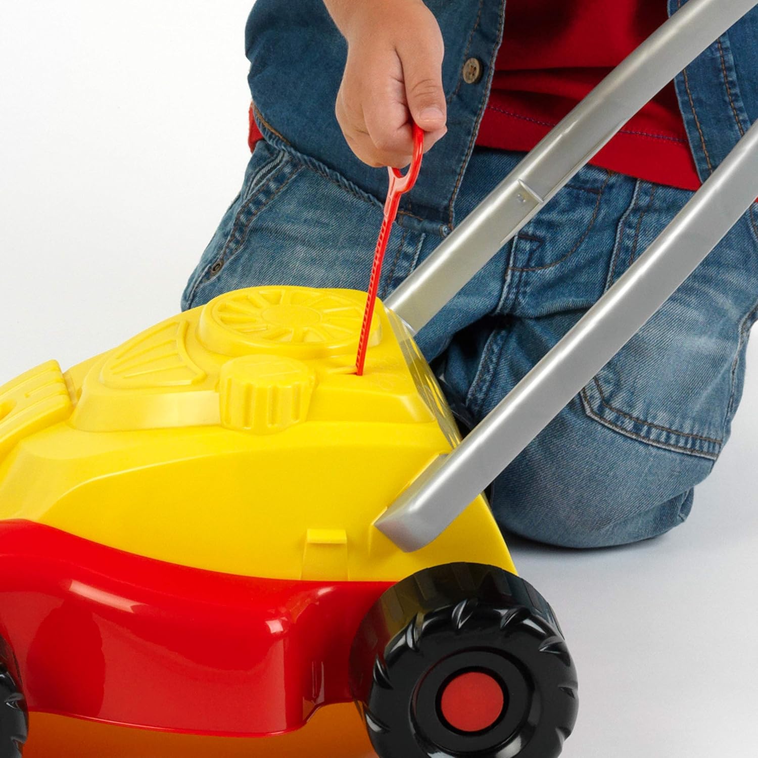 Bild von Theo Klein 2095 Rasenmäher | Robuster Spielzeugrasenmäher | Mechanische Ratsch- und Rattergeräusche | Maße: 55 cm x 30 cm x 17 cm | Spielzeug für Kinder ab 18 Monaten