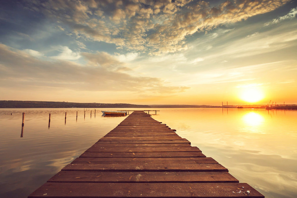 Bild von Papermoon Fototapete "Steg im Wasser"
