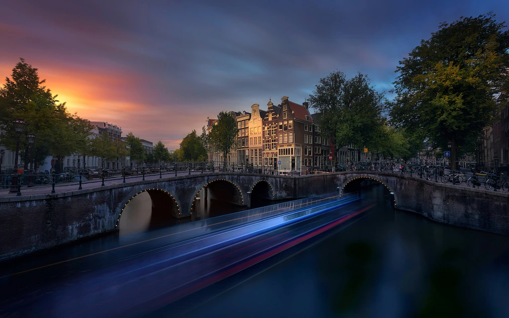 Bild von Papermoon Fototapete "Photo-Art JESUS M GARCIA, AMSTERDAM SONNENUNTERGANG"