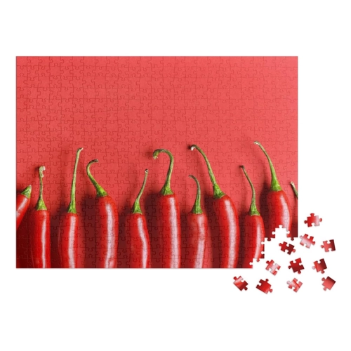 Bild von puzzleYOU Puzzle „Chilischote auf rotem Hintergrund“ – 100 Teile