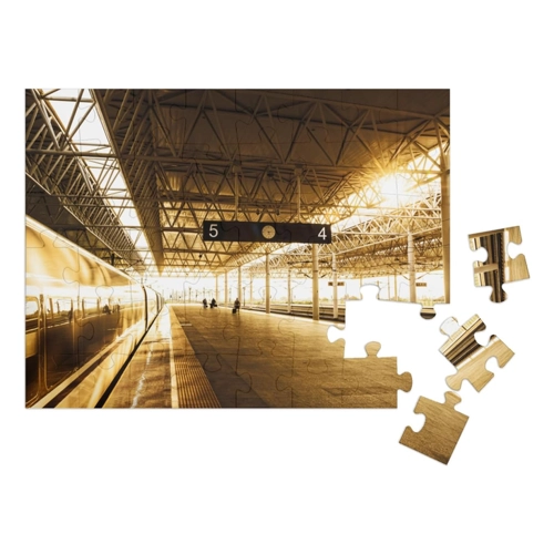 Bild von Puzzle 500 Teile „Zughalt am Bahnhof mit Sonnenuntergang“