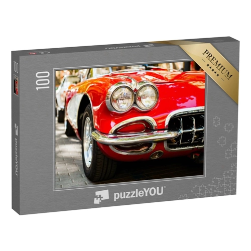 Bild von Puzzle 1000 Teile XXL – Nahaufnahme von Scheinwerfern eines roten Oldtimers
