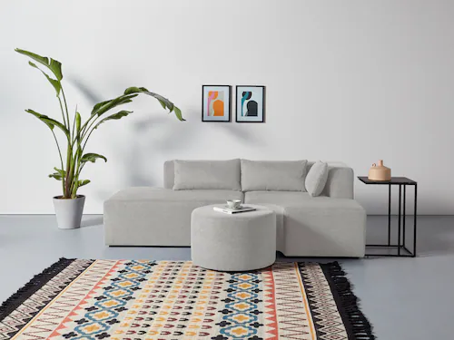 Bild von Leonique Ecksofa "Alexane L-Form", zusammengesetzt aus Modulen, in vielen Bezugsqualitäten und Farben.