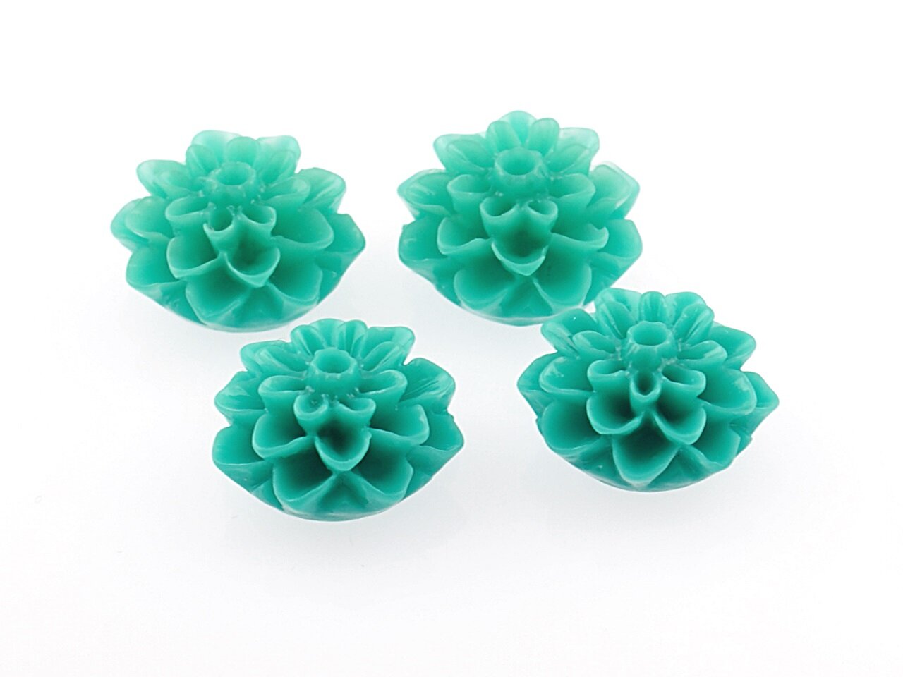 Bild von 4 Cabochons in Blumenform, türkis 15 mm