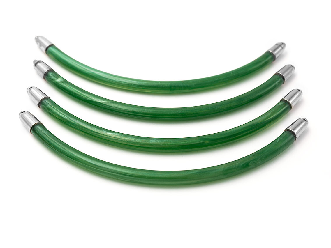 Bild von Verbinder aus Bakelit in grün mit Endkappen in platin im 4er Set