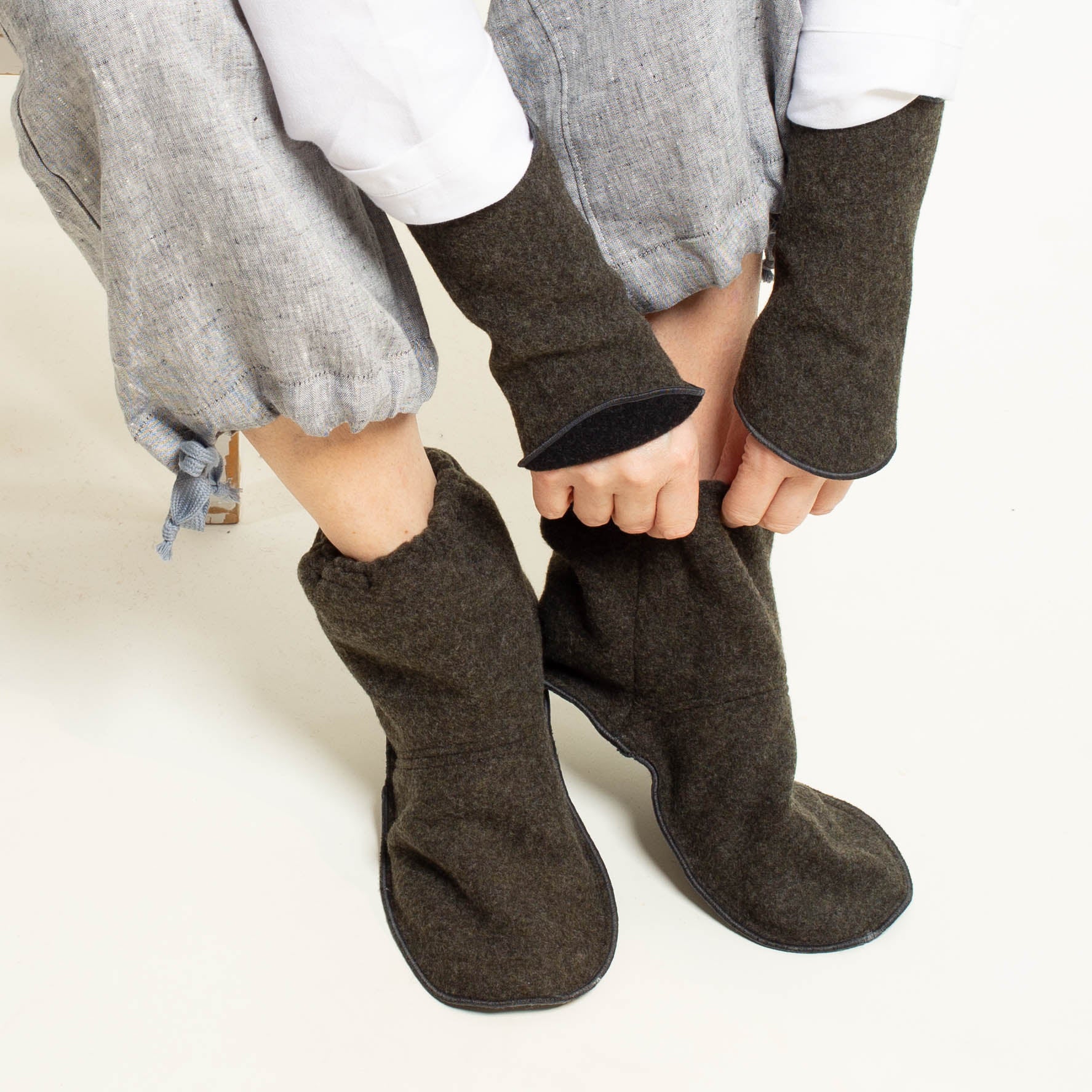 Bild von Bettschuhe | Fuß- und Pulswärmer aus Flauschloden