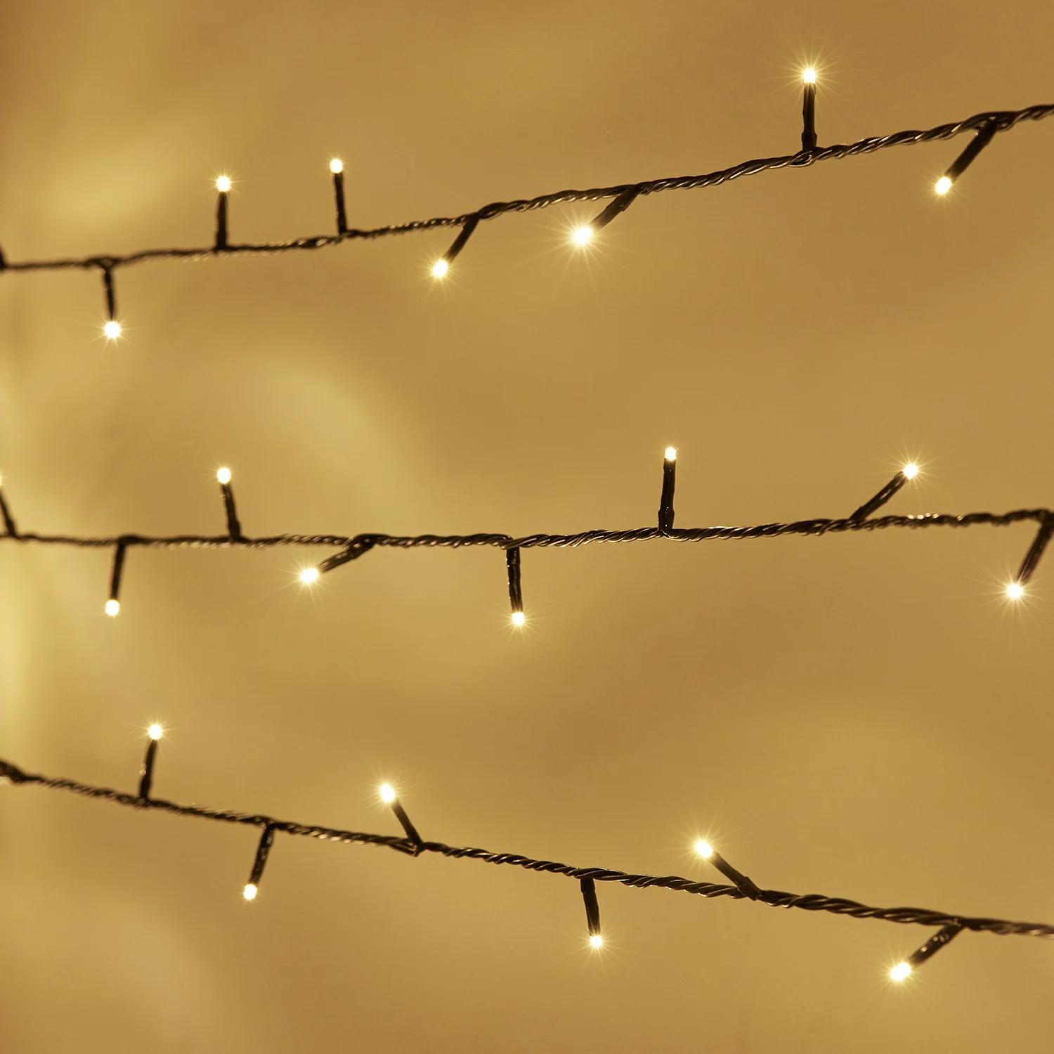 Bild von Essential Connect 20m 200er LED Lichterkette warmweiß koppelbar grünes Kabel