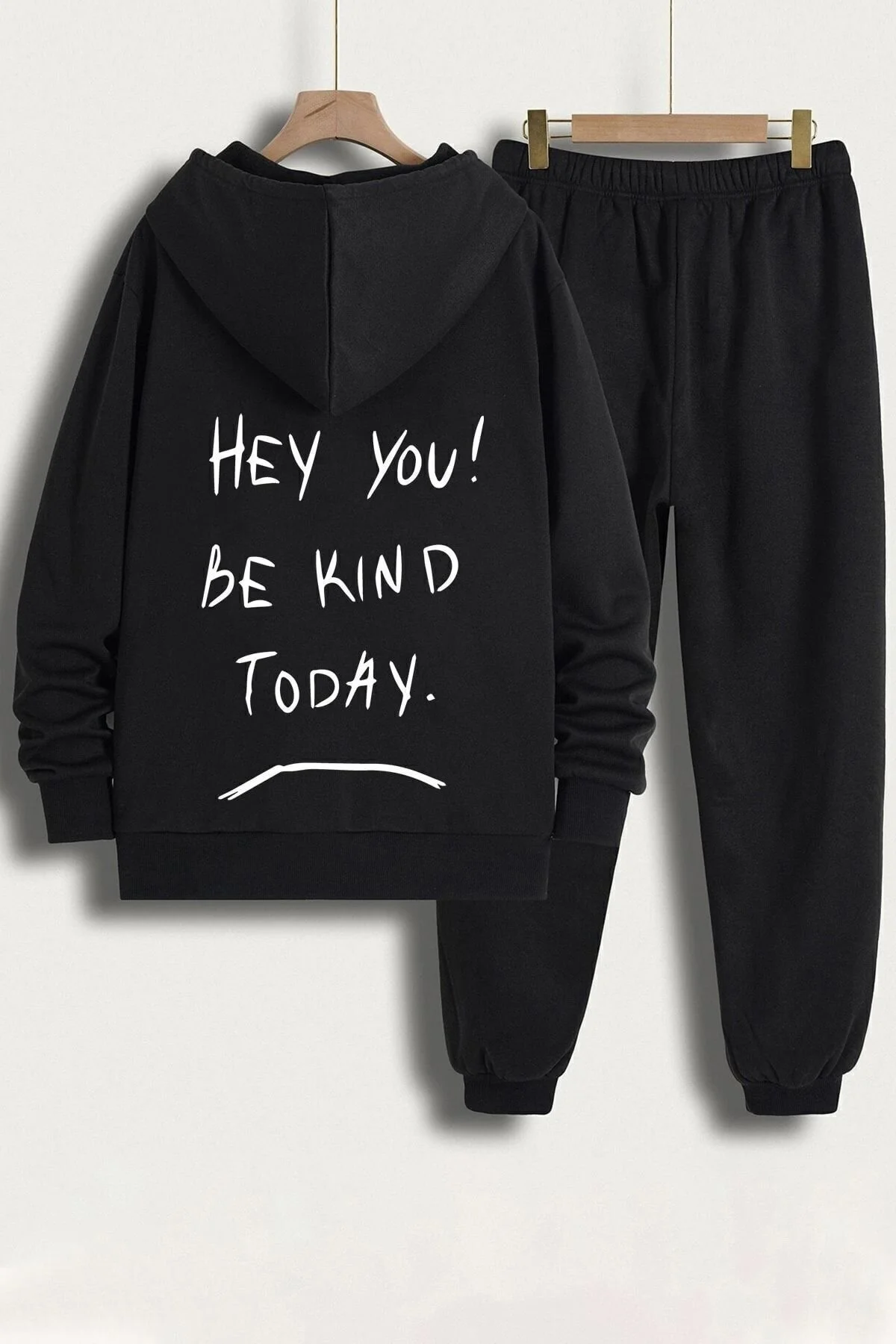 Bild von uyguntarz Bedrucktes Unisex-trainingsanzug-set „hey You“. - S/M