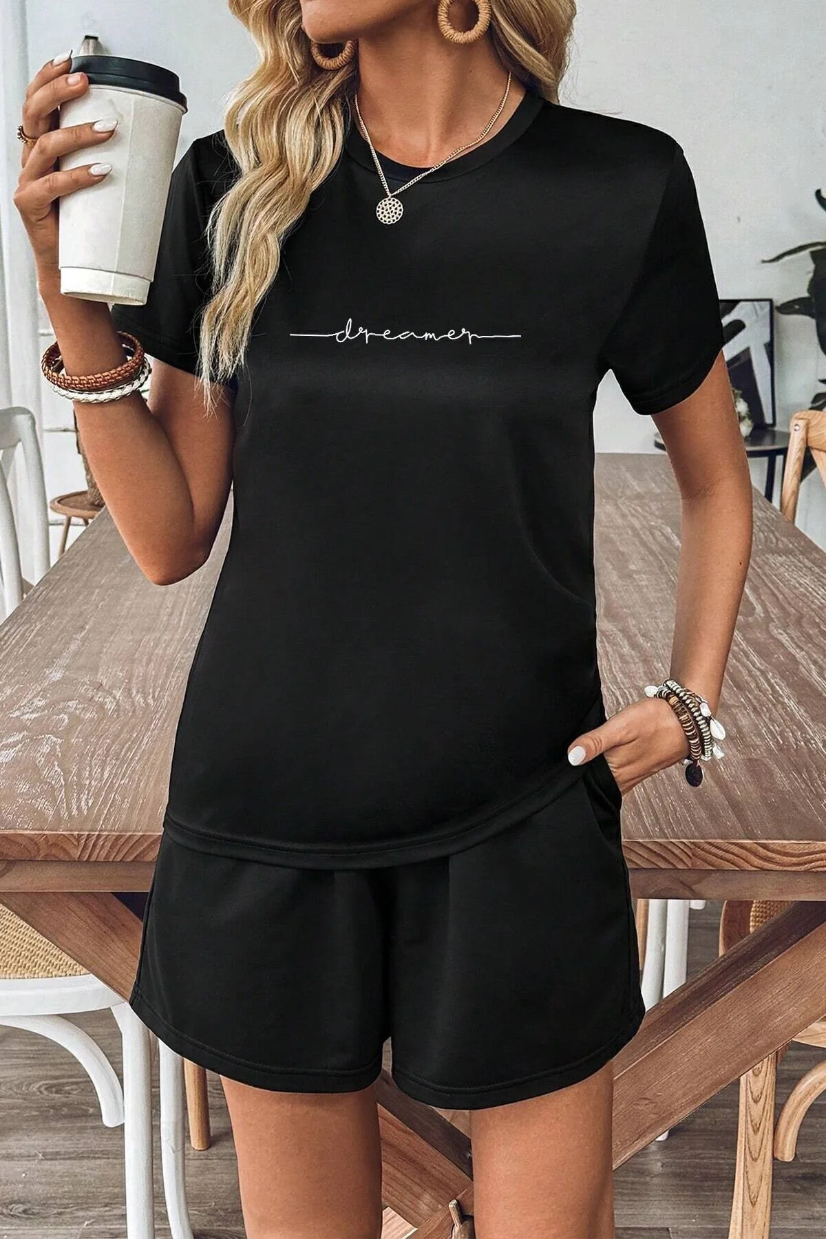 Bild von uyguntarz Bedrucktes Unisex-shorts-set „dreamer“ - S/M