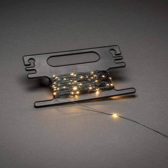 Bild von Konstsmide, 6461-830, LED Tropfenlichterkette, mit Aufroller, 300 bernsteinfarbene Dioden, 3V Außentrafo, dunkelgrüner Draht, 6461-830EE