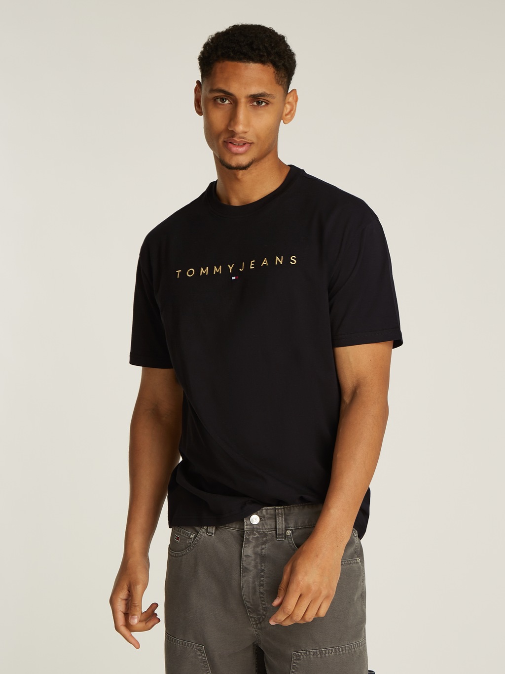 Bild von Tommy Jeans T-Shirt "TJM REG GOLD LINEAR LOGO TEE EXT"