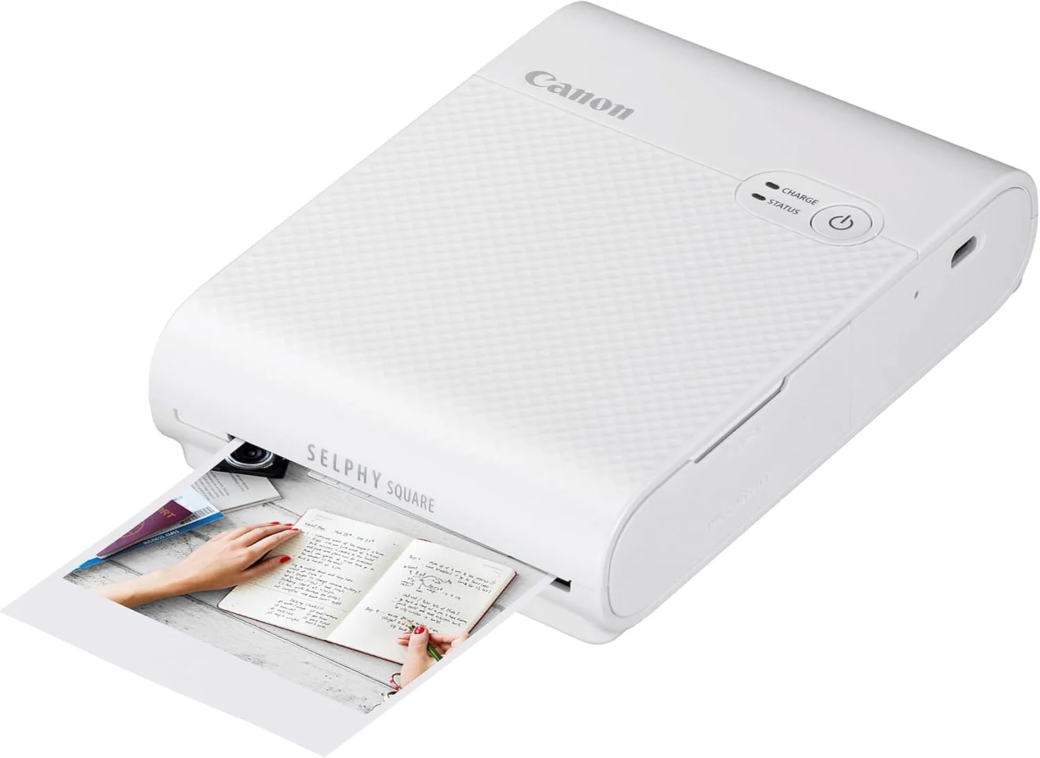 Bild von Canon SELPHY QX10 Mini Fotodrucker in Weiß mit quadratischem Druckformat 6,8 x 6,8 cm, klebender Rückseite, Akku, WLAN und Canon App, inklusive 3er Druck-Set