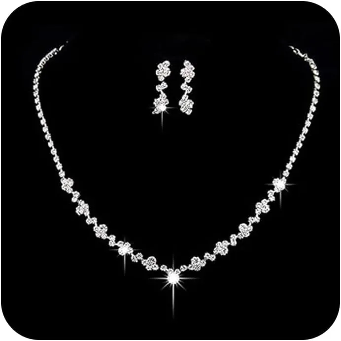 Bild von Unicra Brautschmuck-Set mit Halskette und Ohrringen aus Strass in Silber für Damen und Mädchen